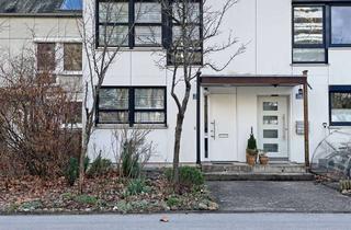 Reihenhaus kaufen in 82024 Taufkirchen, Charmantes Split-Level-Reihenhaus mit viel Potenzial