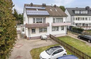 Doppelhaushälfte kaufen in 40880 Ratingen, Zentral gelegene Doppelhaushälfte mit Ausbaureserve und großem Garten