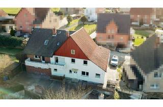 Haus kaufen in 31737 Rinteln, Kapitalanlage-Juwel in Rinteln-Uchtdorf - In großen Zügen saniertes vollvermietetes 3-Parteienhaus