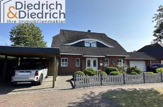 Haus kaufen in 25795 Weddingstedt, Verkauf eines komfortablen Wohnhauses im Villenstil mit Garage und Carport in ruhiger Lage in Weddin