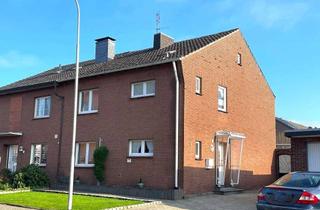 Doppelhaushälfte kaufen in 41379 Brüggen, Teilmodernisierte Doppelhaushälfte mit ansprechendem Grundstück!