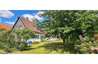 Haus kaufen in 71088 Holzgerlingen, Holzgerlingen: Zweifamilienhaus mit traumhaftem Garten