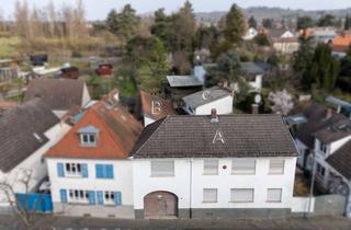 Einfamilienhaus kaufen in 64297 Eberstadt, Solides Anwesen: Zweifamilienhaus mit Einliegerwohnungen und großem Grundstück in zentraler Lage
