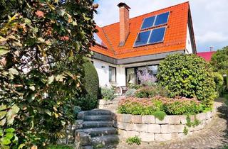 Einfamilienhaus kaufen in Willibald-Pirckheimer-Str. 11, 90562 Heroldsberg, geräumiges Einfamilienhaus mit 2 separaten Wohnungen