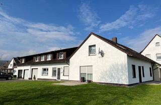 Mehrfamilienhaus kaufen in 37697 Lauenförde, Lauenförde - Großzügiges Mehrfamilienhaus mit vier Wohnungen auf großem Grundstück!