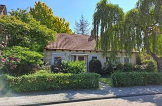 Haus kaufen in 26419 Schortens, Ebenerdiges Wohnen auf großem Grundstück in zentraler Lage von Heidmühle!