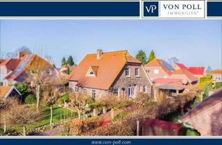 Haus kaufen in 26556 Eversmeer, Stilvolles Friesenhaus mit idyllischem Garten