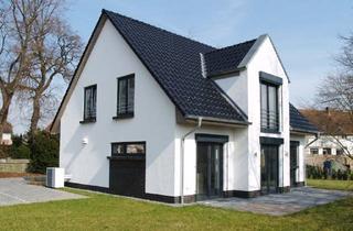 Einfamilienhaus kaufen in 32479 Hille-Hartum, Hille-Hartum - Modernes Haus mit Zwerchgiebel