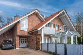 Haus kaufen in 64807 Dieburg, Ein Traum in Klinker: Exklusives Familienidyll mit Wintergarten in Dieburg