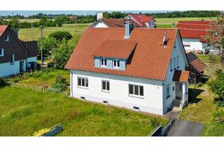 Haus kaufen in 88284 Wolpertswende, Sanierungsbedürftiges Zweifamilienhaus mit Baulandreserve