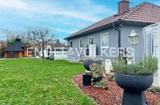 Haus kaufen in 63667 Nidda - Ober-Schmitten, Nidda - Ober-Schmitten - Naturnahes Fertighaus mit Einliegerwohnung & energieeffizienter Wärmepumpe