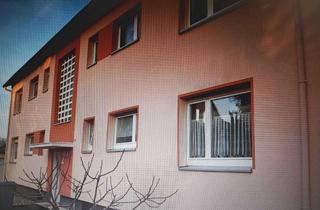 Wohnung kaufen in 63165 Mühlheim am Main, Gemütliche, vermietete 3-Zimmer-Erdgeschosswohnung mit Balkon u. Garage