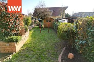 Reihenhaus kaufen in 31558 Hagenburg, Einladendes Zuhause mit Garage und charmantem Garten: Geräumiges Reihenhaus für Familien