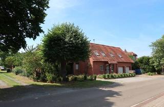 Haus kaufen in 32469 Petershagen, Petershagen - Zweifamilienhaus mit großem Anbau in Petershagen-Quetzen!
