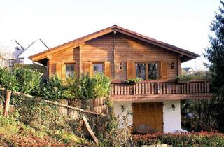 Haus kaufen in 51545 Waldbröl, Holzblockhaus mit zwei Wohnungen in ruhiger Dorfrandlage Nähe Waldbröl