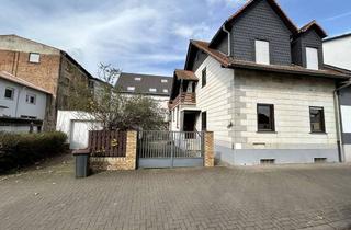 Doppelhaushälfte kaufen in 61169 Friedberg (Hessen), Doppelhaushälfte als Rohdiamant zur Sanierung