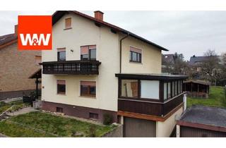 Haus kaufen in 35510 Butzbach, Butzbach - Das versteckte Juwel-Zweifamilienhaus mit Potenzial