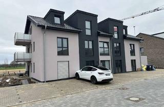 Wohnung kaufen in 52525 Heinsberg, Moderne Eigentumswohnung im Dachgeschoss in ruhiger Lage von Heinsberg-Porselen