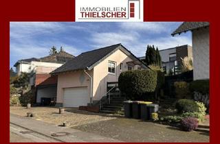 Einfamilienhaus kaufen in 52531 Übach-Palenberg, Geräumiges Einfamilienhaus mit separater Gewerbeeinheit, Garage und großem Garten