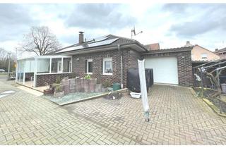 Haus kaufen in 26826 Weener, Ebenerdiger Bungalow mit Garage und Doppelgarage im Zentrum von Weener
