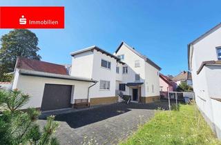 Haus kaufen in 63110 Rodgau, Wohnen mit Perspektive: Zweifamilienhaus auf WEG-Grundstück mit viel Raum
