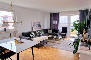 Wohnung kaufen in 65474 Bischofsheim, Moderne Stadtwohnung mit Balkon und grünem Ausblick