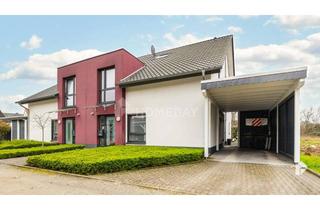 Wohnung kaufen in 33397 Rietberg, Stilvolle 4-Zimmer-Maisonettewohnung mit Balkon, Carport und EBK