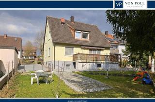 Einfamilienhaus kaufen in 97241 Bergtheim, Bergtheim - Zwei-Parteienhaus in ruhiger Lage mit gepflegten Garten zu verkaufen