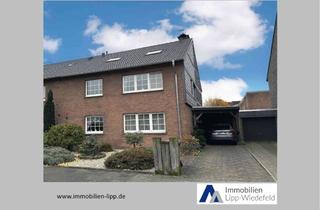 Doppelhaushälfte kaufen in 47906 Kempen, Modernisierte Doppelhaushälfte mit sonnigem Garten und Garage im Kempener Norden