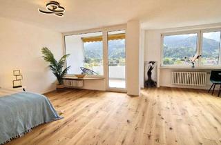 Wohnung kaufen in 82467 Garmisch-Partenkirchen, Stilvolle, geräumige 1-Zimmer-Wohnung mit Balkon in Garmisch-Partenkirchen