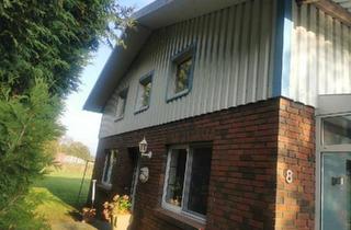 Haus kaufen in 26409 Wittmund, Wittmund - Wohnhaus mit Halle, Wintergarten und Fahrzeugremise - TOP Lage!!