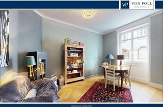 Wohnung kaufen in 60431 Ginnheim, Stilvolle Zwei-Zimmer-Wohnung mit Terrasse und Gartennutzung in idyllischer Lage