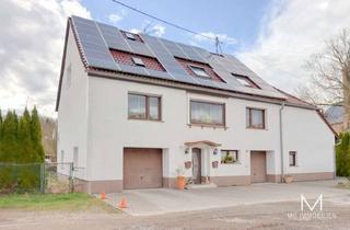 Haus kaufen in 66907 Glan-Münchweiler, MG - Ein- bis Zweifamilienhaus mit Garten und 2 Garagen in Glan-Münchweiler