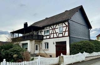 Einfamilienhaus kaufen in 35216 Biedenkopf, Gepflegtes Einfamilienhaus mit vermietbarem Garagenkomplex in Wallau zu verkaufen.