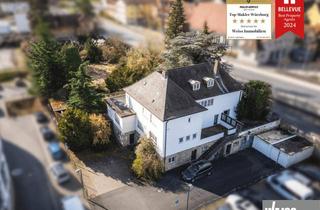 Haus kaufen in Jahnstraße, 97199 Ochsenfurt, Investoren aufgepasst: Zweifamilienhaus mit baureifem Grundstück