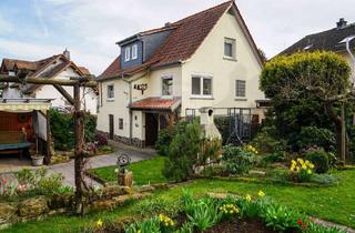 Einfamilienhaus kaufen in 63654 Büdingen, Familienfreundliches Wohnen: Einfamilienhaus mit liebevoll gestaltetem Garten in Büdingen