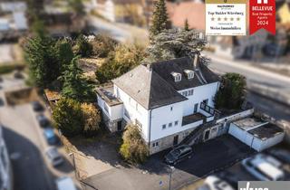 Haus kaufen in 97199 Ochsenfurt, Ochsenfurt - Investoren aufgepasst: Zweifamilienhaus mit baureifem Grundstück