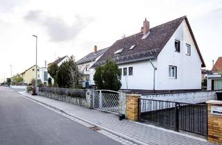 Haus kaufen in 65479 Raunheim, Charmantes Zweifamilienhaus in Raunheim: Raum für Familie und Kreativität