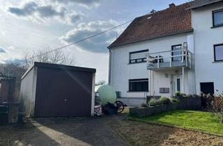 Haus kaufen in 66629 Freisen, Vermietetes Zweifamilienhaus - Grügelborn