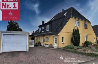 Doppelhaushälfte kaufen in 59192 Bergkamen, Solide Zechen-Doppelhaushälfte mit Garage und Garten