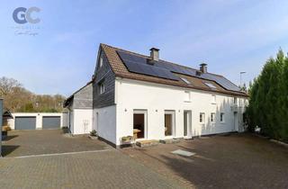 Mehrfamilienhaus kaufen in 40721 Hilden, Perfekte Harmonie: Modernes Mehrfamilienhaus mit 3 Wohneinheiten in Top-Lage