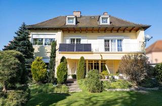Villa kaufen in 86554 Pöttmes, Einzigartige Walmdachvilla mit liebevoll angelegtem Grundstück mitten in Pöttmes