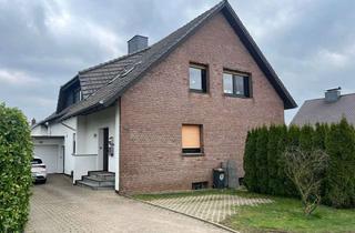 Haus kaufen in 32609 Hüllhorst, Gepflegtes Zweifamilienhaus mit Weitblick in einer ruhigen Anliegerstraße von Hüllhorst!