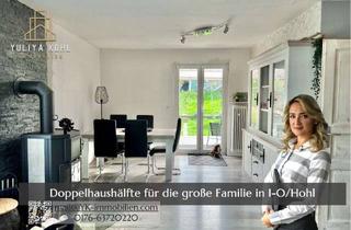 Doppelhaushälfte kaufen in 55743 Idar-Oberstein, Geräumiges Familienparadies: Charmante Doppelhaushälfte mit 5 Schlafzimmern