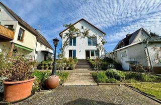 Einfamilienhaus kaufen in 63329 Egelsbach, Egelsbach - Charmantes EFH mit grüner Oase am Tränkbach in ruhiger Lage