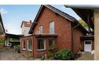 Haus kaufen in 32457 Porta Westfalica, Wohngenuss pur: Attraktives EFH mit Garten, Pool, Terrasse und Sauna in idyllischer Lage
