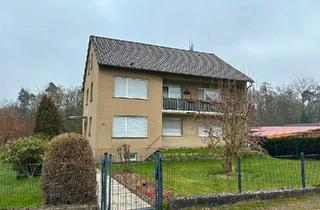 Haus kaufen in 31737 Rinteln, Rinteln - Preiswertes Zweifamilienhaus in Rinteln mit Ausbaureserve