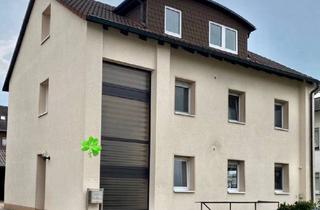 Haus kaufen in 32139 Spenge, Spenge - Dreifamilienhaus in SpengeWallenbrück