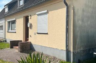 Haus kaufen in 24768 Rendsburg, Rendsburg - Bewohnbare kleine DHH mit Sanierungsbedarf in mediterranem Flair