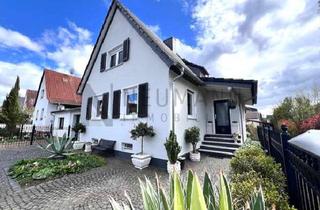 Einfamilienhaus kaufen in 64546 Mörfelden-Walldorf, Charmantes Einfamilienhaus mit Liebe zum Detail